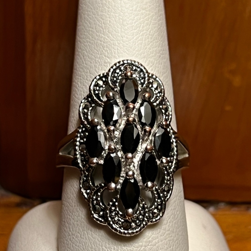 Size 9 silver tone cocktail ring with black stones inn Marcasite setting